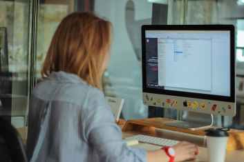 woman using computer in office